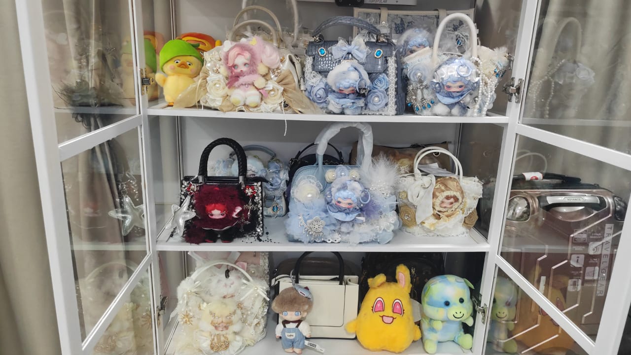 Anna with their BooBoo Plush bag