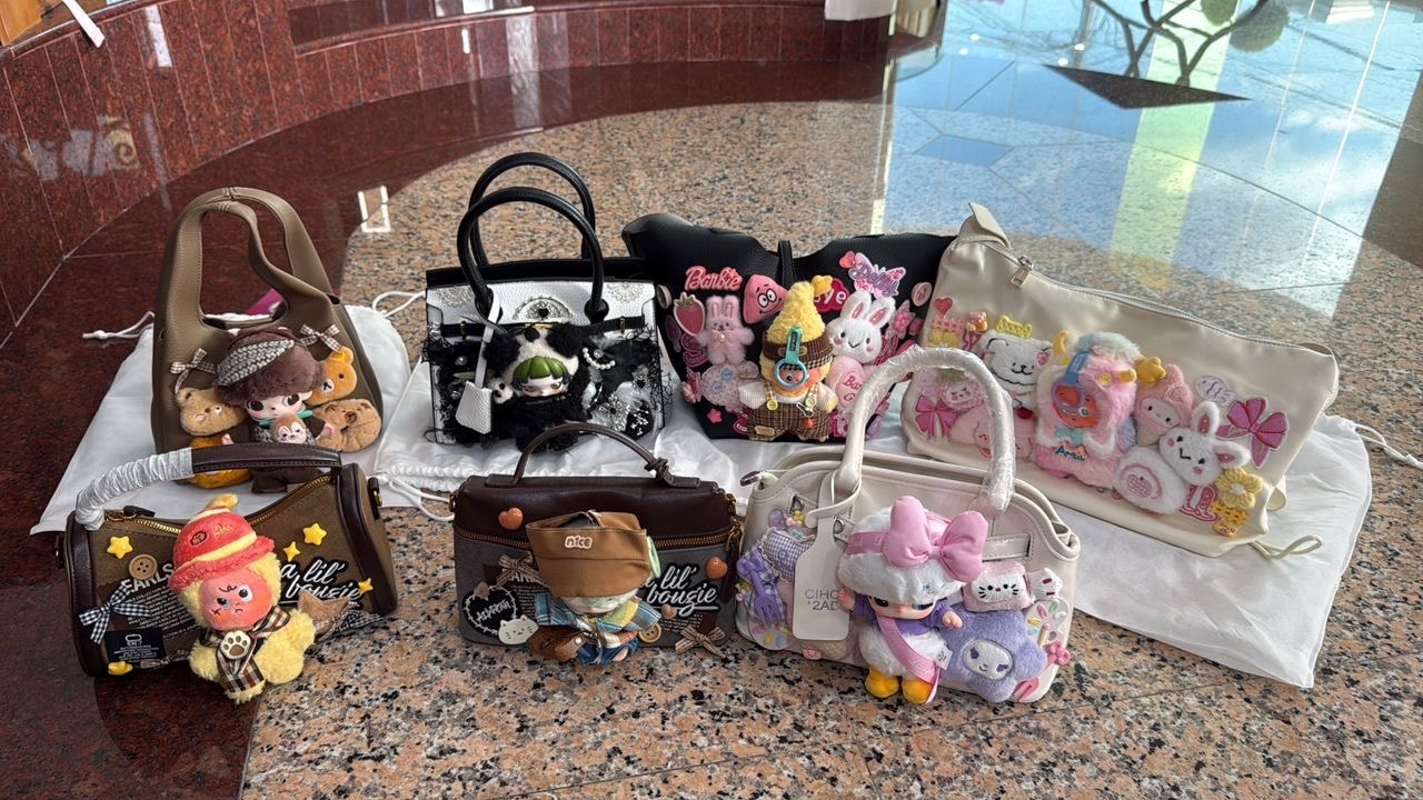 Elyn Siow with their BooBoo Plush bag